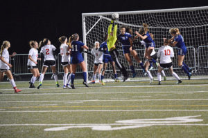 Camas goalkeeper Falissitie DePasquale reaches up to defend a shot on goal by Bellarmine Prep in the final minutes of Wednesday's state playoff game, at Doc Harris Stadium. The Papermakers defeated the Lions 1-0 to advance to the quarterfinals.