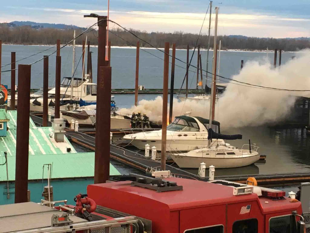 Camas-Washougal Fire crews, along with East County Fire and Rescue firefighters and a Vancouver Fire Department boat, responded to a boat fire Tuesday, Dec. 26, after it was reported at 3:45 p.m. CWFD Battalion Chief Allen Wolk said the boat, located on H-Dock, is a total loss. (Photo contributed by Port of Camas-Washougal)