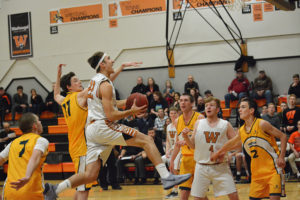 Carson Adams soars to the hoop for two points for the Panthers against Frances de Sales High School, of Melbourne, Australia, at Washougal High School Monday. Washougal won 57-47 to improve to 2-1 on the season.