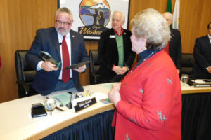 Washougal Mayor-elect Molly Coston presented a clock and a proclamation to Mayor Sean Guard during his final City Council meeting Monday, Dec. 11. Guard plans to move to Clark County, outside the city limits of Vancouver, in January. Coston will be sworn in as Washougal mayor at 4 p.m., Thursday, Dec. 28, in the council chambers at City Hall, 1701 "C" St. 