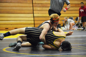 Tanner Lees takes down a Hudson's Bay Eagle on Dec. 6, at Hudson's Bay High School. After finishing in fourth place last season, the Washougal wrestler would love to reach the top of the podium at the Tacoma Dome.