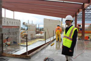 Aaron Smith, principal of Odyssey Middle School, stands inside the construction site at the future Discovery High in Camas on Jan. 22.
