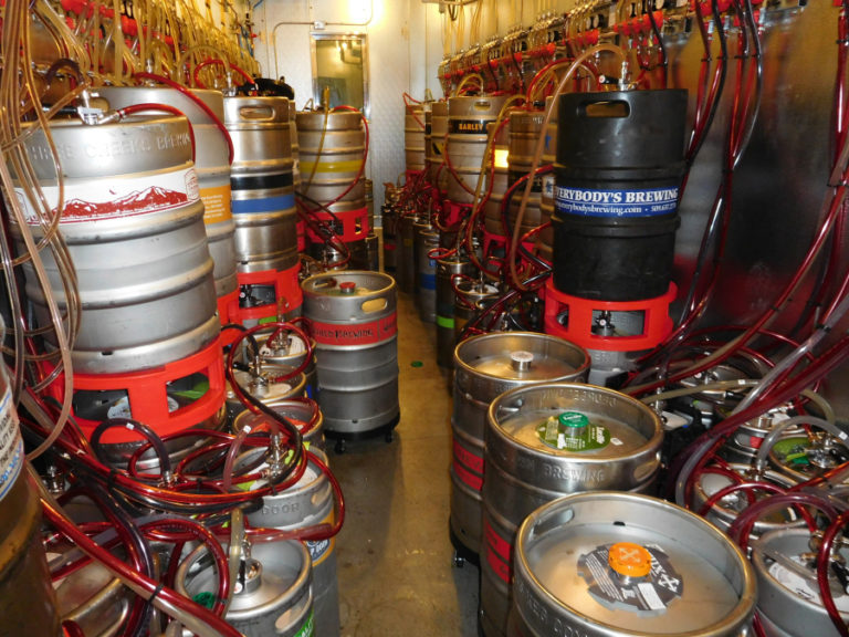 One hundred kegs are located in the walk-in keg cooler at Growler USA, in Camas.