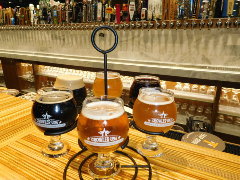 A flight of beer at Growler USA features six, 4 oz. pours.