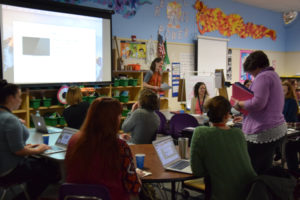 Heidi Kellar, Washougal School District's mentor to new educators, talks to teachers during the monthly new-teachers meeting at Hathaway Elementary School, on Feb. 5. (Tori Benavente/Post-Record)