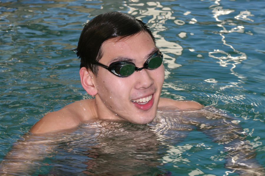 Camas High School senior and state swimming champion Mark Kim completes a long training session on Monday, Feb. 12.