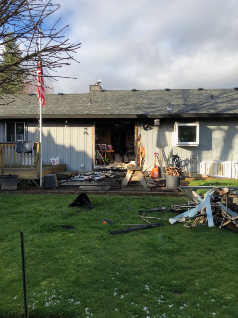 Camas-Washougal firefighters rescued a man and his two dogs from this home on Wednesday, Feb. 14, after a small kitchen fire spread, causing smoke to fill the residence. The firefighters union later filed a complaint with the Washington State Department of Labor and Industries, alleging that low staffing numbers at the fire department lead to unsafe working conditions and make it hard for firefighters to put out fires and save people trapped inside burning buildings. (Photo courtesy of Camas-Washougal Fire Department)