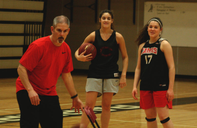 Camas High School girls&#039; head basketball coach Scott Preuninger sets up drills in the Camas gym on Feb. 26.