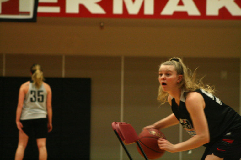 Camas High School all-league point guard Haley Hansen dribbles around chairs in the Camas gym on Monday Feb.