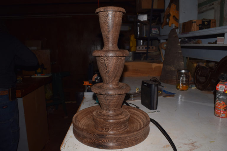 A lamp that John Furniss is working on in his shed.