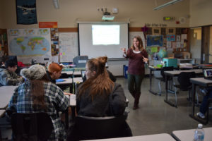 Monica Winkley, social studies and mindfulness teacher at Hayes Freedom High School, leads her class in an opening discussion on Monday, Feb. 12. 