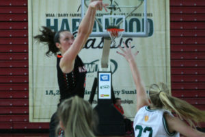 Panther leading scorer and rebounder Beyonce Bea pops a jumper during a state tournament game against the Lynden Lions on Feb. 28, at the Yakima Sundome. 