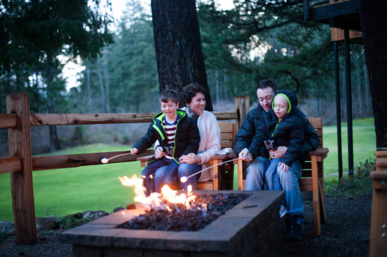 Declan Reagan (right) and his father, Francis, mother, Lauren, and brother, Adrian, enjoy some quality family time making s&#039;mores at a campfire by Skamania Lodge, in Stevenson. The Reagan family spent a night in one of the lodge&#039;s treehouses in January. Declan, 5, was diagnosed with Acute Myeloid Leukemia in May of 2016.