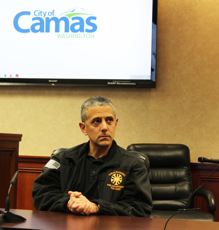 Camas-Washougal Fire Chief Nick Swinhart listens as firefighters and supporters tell Camas City Council members on Monday, March 19, that the city needs to find a way to have at least three, if not four, firefighters on each engine call if firefighters are going to safely fight fires and save lives. 