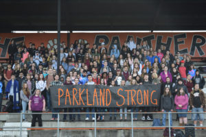 The Washougal High School students gather for a group photo after taking part in a March 14 ceremony honoring the 17 victims of the Parkland, Florida school shooting. 