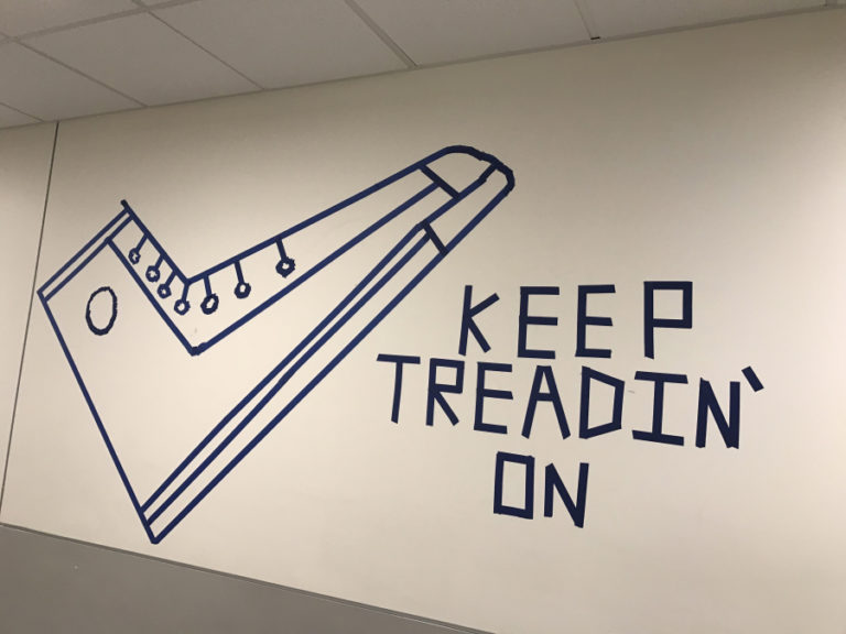 Jemtegaard eighth grade student Ethan Cherry created a mural depicting a shoe and the words &quot;Keep Treadin&#039; On,&quot; as his tape art project. Cherry said that the mural is a personal reminder that if you keep treadin&#039; on, you will get past challenging times and everything will be OK.