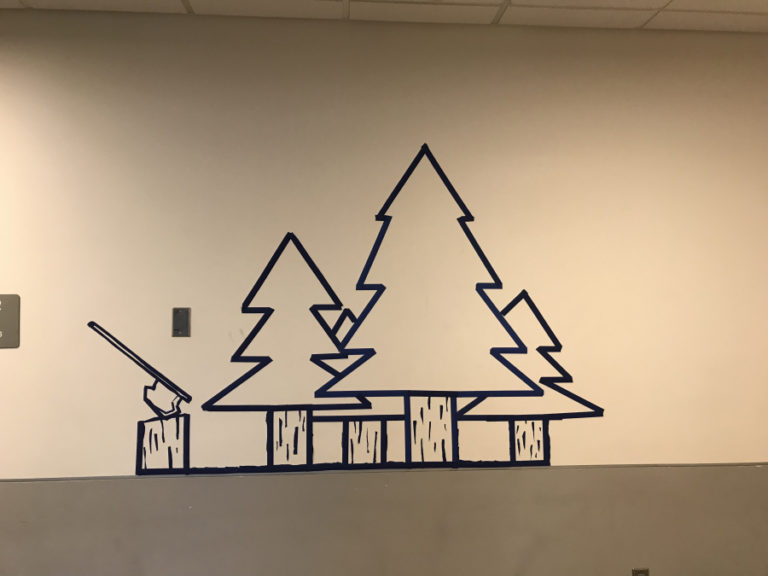 Seventh grade student Cale Larson created the mural, &quot;A couple of trees,&quot; as his tape art project.