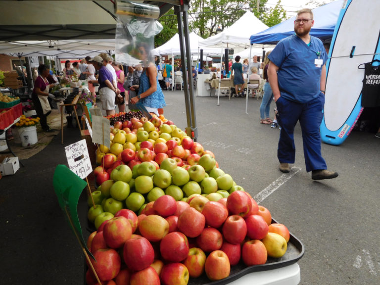 Vendors sell apples, cherries and other produce at the Camas Farmers Market in June of 2016. The Camas Farmers Market opens its 2018 season on June 6.