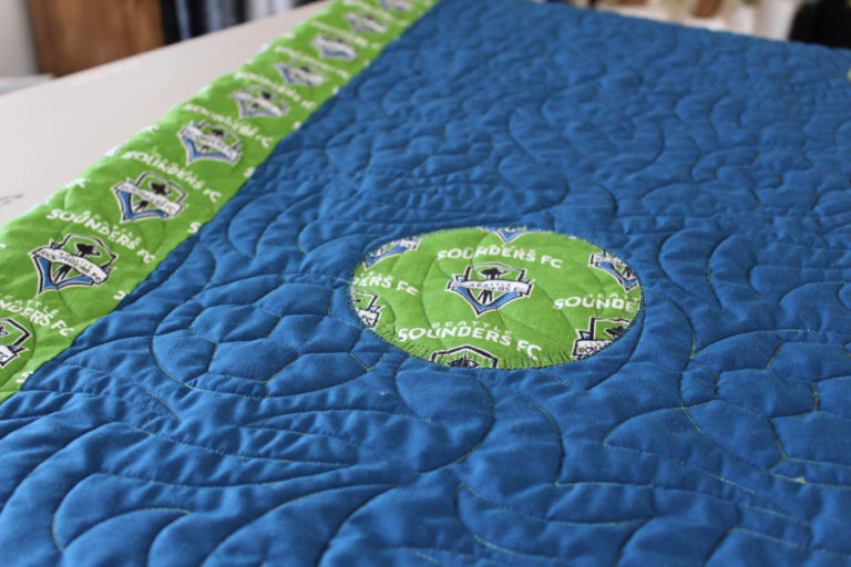 Camas quilter DeAnn Perrigo&#039;s 10-year-old grandson, Collin Woods, created this &quot;Seattle Sounders&quot; quilt for the upcoming Clark County Quilters&#039; 43rd annual Quilt Show, April 5-7 at the Clark County Event Center in Ridgefield.
