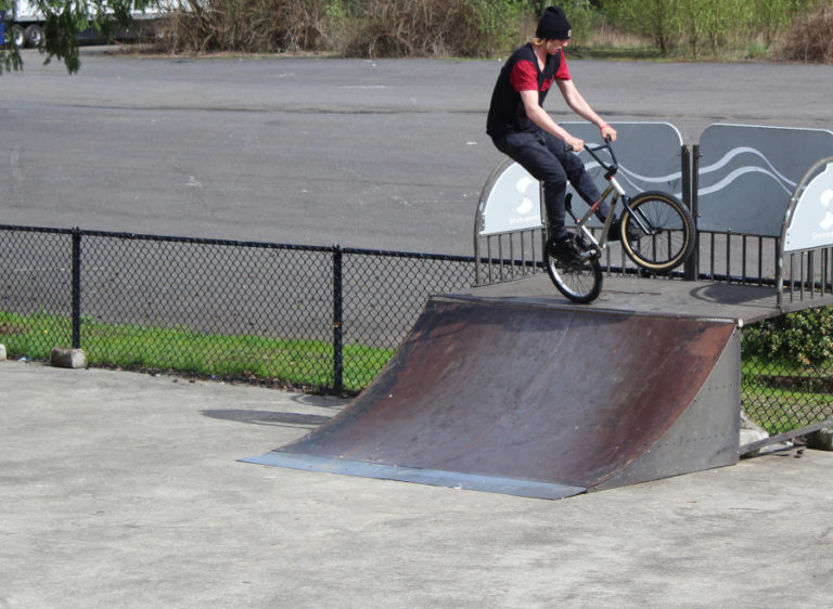 Hunter Toy, 19, of Washougal, bikes at the Camas-Washougal Riverside Skate Park on Monday, April 9. Toy is one of about 60 youth who have joined a group called Riverside Bowl to nudge city and community leaders into improving and maintaining the aging skatepark.