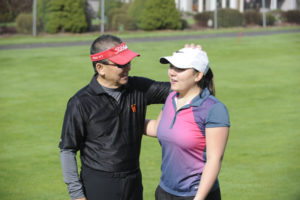 Washougal senior Kallie Sakamoto shares her passion for golf with her father, David. 