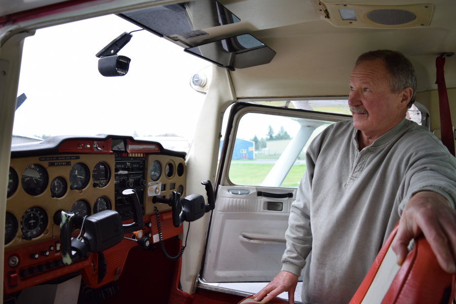 Dennis Kozacek, 69, inside the Cessna 150 aircraft used by flight instructors at ATC Camas to teach new pilots to fly. Kozacek was the original owner of the plane before he sold it to the flight training business. (Tori Benavente/Post-Record)