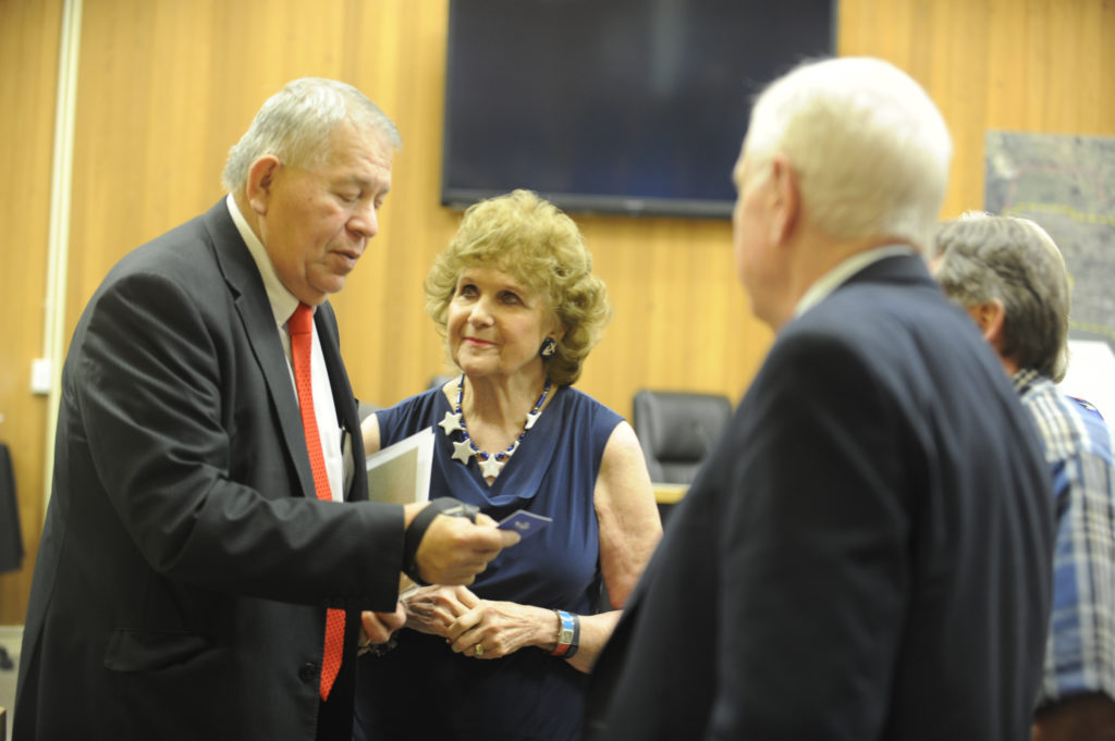 (Dawn Feldhaus/Post-Record)
New Washougal City Council member Ernie Suggs (left) talks with City Councilman Ray Kutch, Port of Camas-Washougal Commissioner Larry Keister and Judy Kutch (right to left), after the Monday, April 23 Council meeting. Suggs and Janice Ferguson (not pictured) were the finalists after the council interviewed eight applicants.