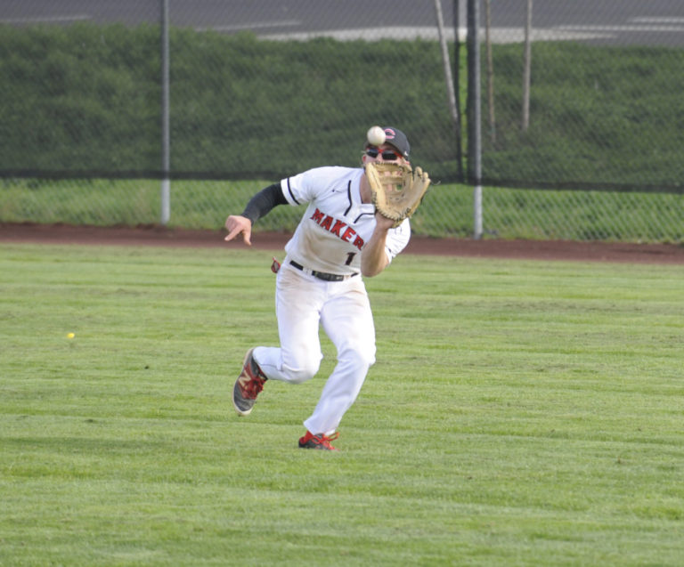Camas right fielder Taylor Adams makes a running catch during a game against Skyview on April 18.