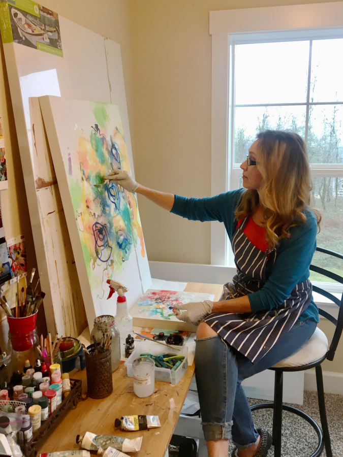 Washougal artist Kathy Beckman works on an acrylic on canvas painting. Beckman is one of 18 artists featured in the Mother&#039;s Day weekend Washougal Studio Artists Tour, and will be located at 3990 Birch St., during the event.