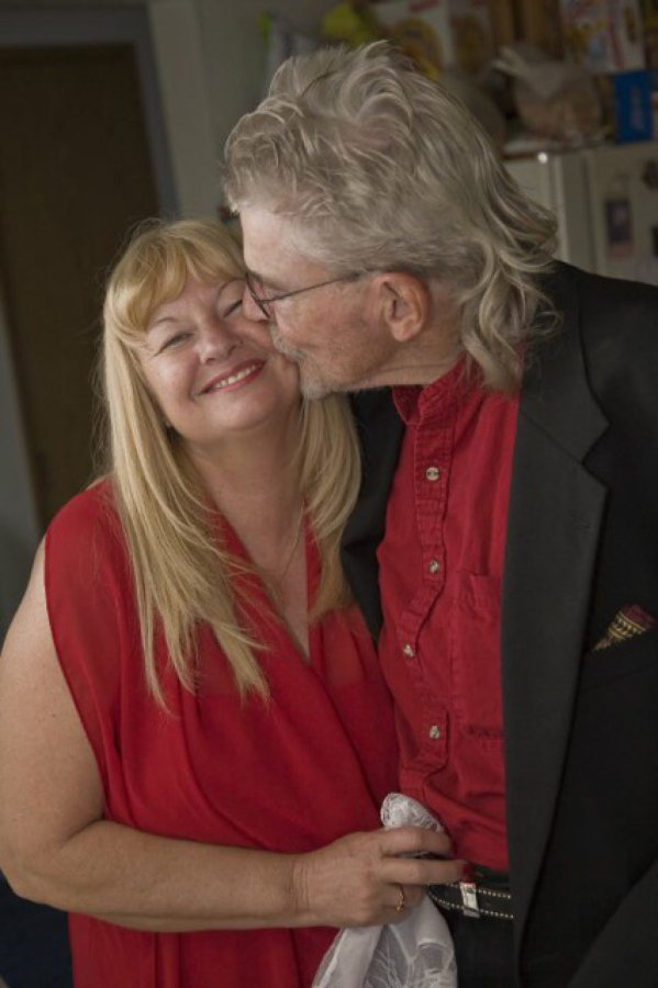 Arthur Nichols (right) kisses his girlfriend of 25 years, Cathy Nagode (left).