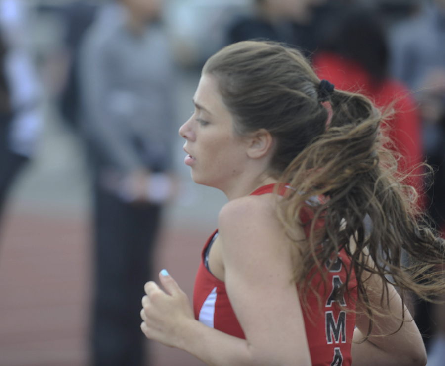 Distance runner Halle Jenkins wins another distance race against Union High School on Friday, May 4.