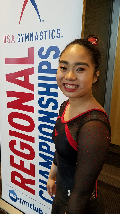 (Contributed photo courtesy of the Sugimoto family) Kaylee Sugimoto smiles after qualifying to represent USA Gymnastics Region 2 at the national competition in Cincinnati, Ohio in May 2019.