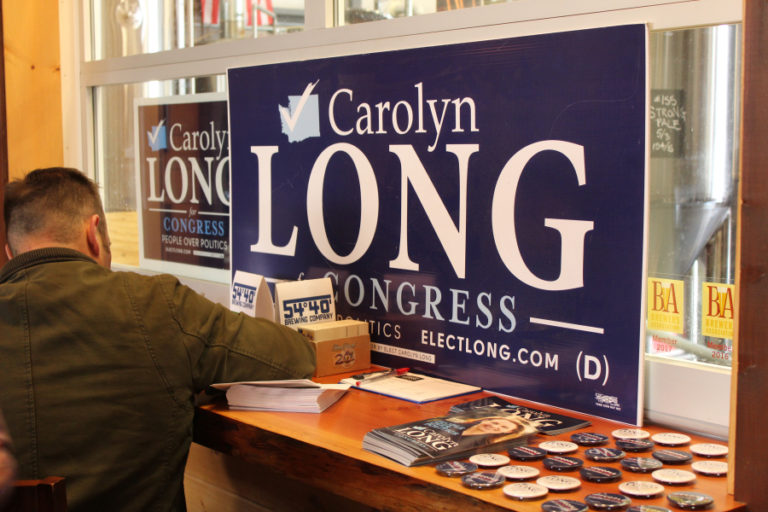 Signs for congressional candidate Carolyn Long, a Democrat challenger to Republican Rep.