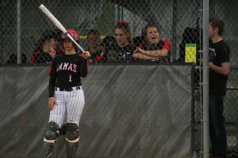 Senior catcher Abbi Wong on deck as her team cheers for more offense at Union High School on Wednesday, May 9.