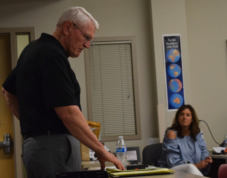 Retired U.S. Army Brigadier General Robert McFarlin observes his notes while speaking to Lori Thornton&#039;s (right) world history class at Camas High School, Friday, May 18. McFarlin retired from the U.S.