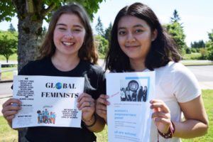 Camas High School juniors Rachel Blair and Tsering Shola hold flyers for the upcoming Women Empowerment Panel, to be held from 6:30 to 8 p.m., Friday, June 1, in the North Commons of Camas High School. The pair have organized this panel on their own time to bring discussion and understanding to what feminism is in 2018. (Tori Benavente/Post-Record)