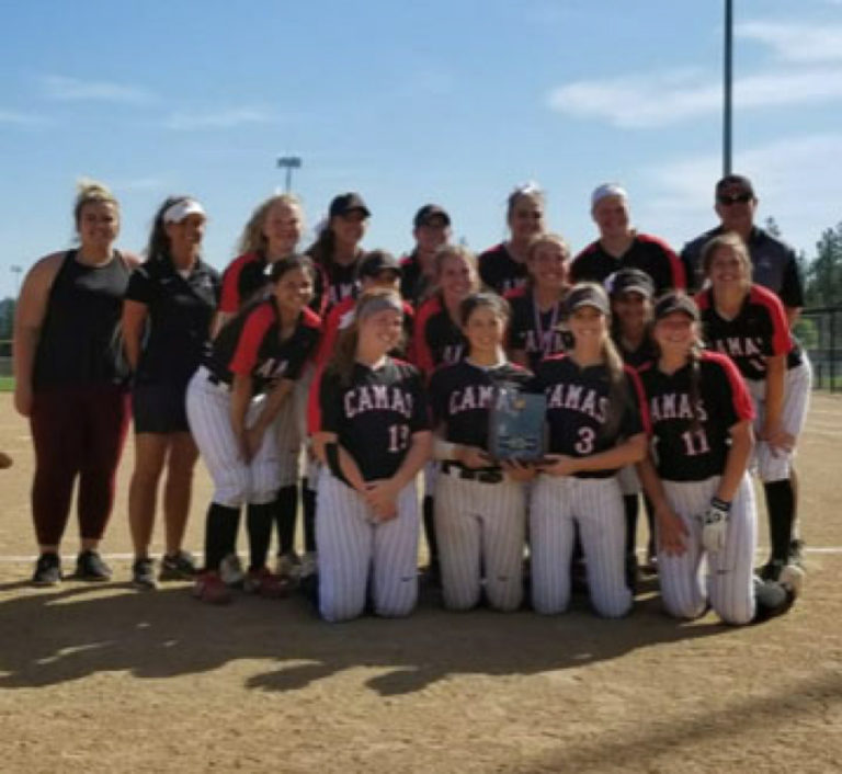 The Papermakers softball team celebrates a fourth-place finish at the state softball tournament, held May 25-26 in Spokane.