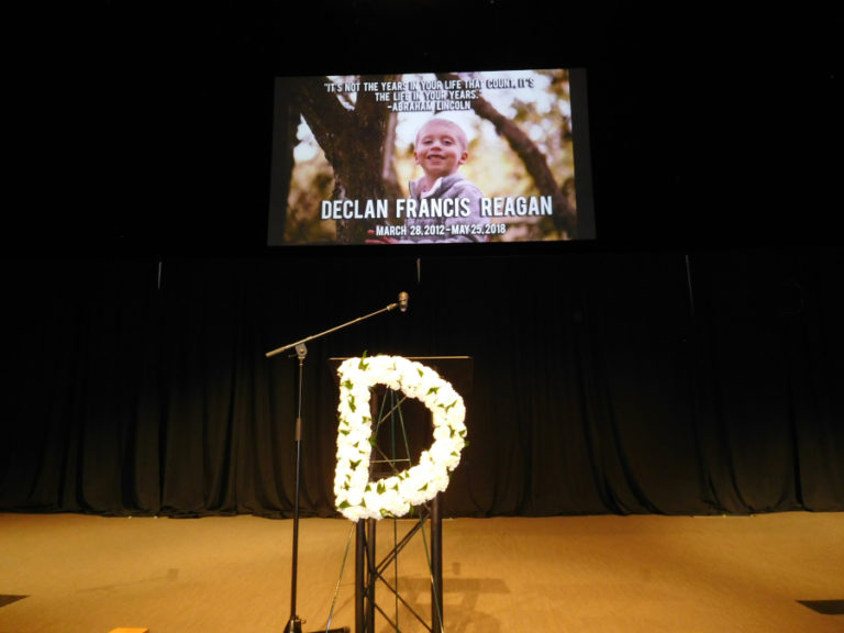 The interior of Northwest Gospel Church included a photo of Declan Reagan, a quote attributed to President Abraham Lincoln and flowers arranged in the shape of the letter, D, for Reagan&#039;s celebration of life service, Saturday, June 9.  Reagan, son of Washougal Police Officer Francis Reagan and Lauren Reagan, died at the age of 6 on May 25, after battling two types of cancer.