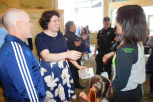 Lauren Reagan (left), greets supporters after the celebration of life service for her son, Declan, 6, Saturday, June 9, at Northwest Gospel Church, in Vancouver. Attendees included Washougal Police officers, Camas-Washougal firefighters and paramedics and representatives of area businesses. (Dawn Feldhaus/Post-Record)