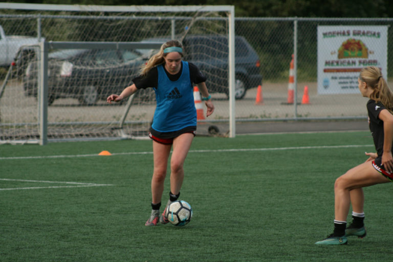 Washougal High School&#039;s Lauren Snedeker takes control of the ball in preparation for the U.S.