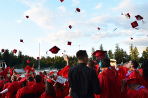 The Camas High School class of 2018 graduates send their caps flying in celebration of their achievement on Friday, June 15. 