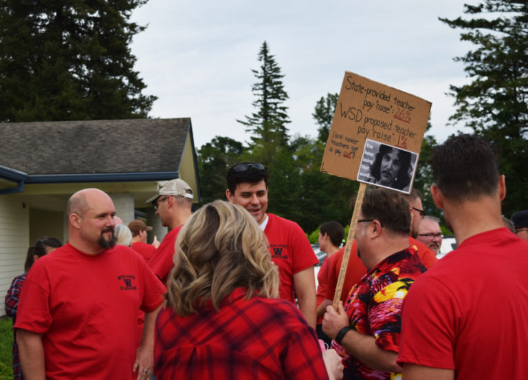 Washougal School District teachers gather outside the Washougal district office before a school board of directors meeting June 12.
