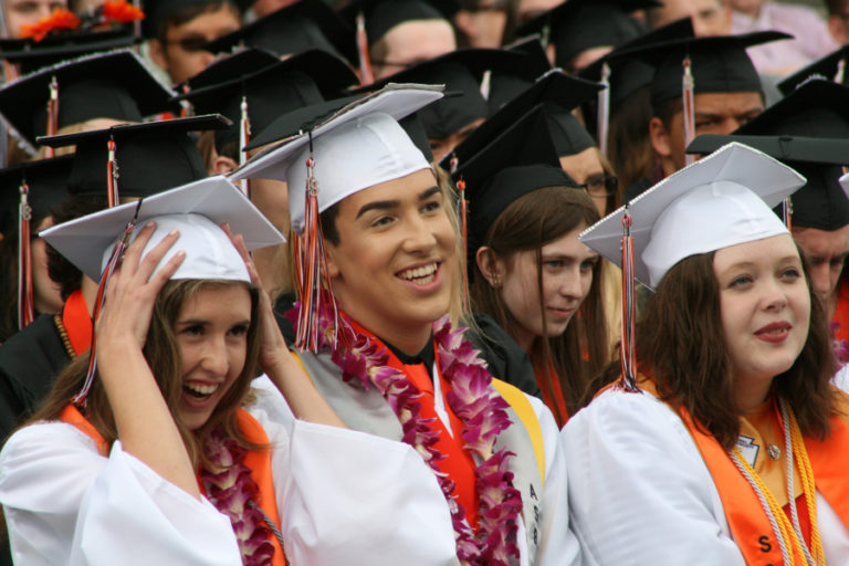 (Post-Record file photo) Washougal High seniors attend graduation at Fishback Stadium in June 2019. This year's Class of 2020 graduates are not able to have in-person graduation events thanks to ongoing COVID-19 pandemic shutdowns, but  will have online recognition, a parade and a sunset-viewing event.