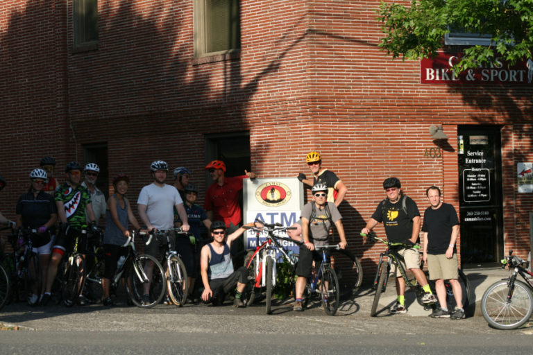 Local bicyclists gather at Camas Bike and Sport for an evening ride to celebrate nine years of the shop doing business in Camas.