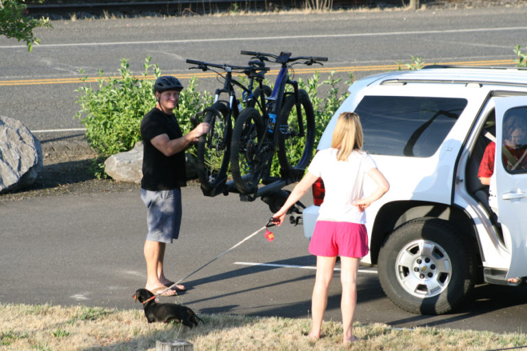 Matt Wessel from Camas unloads bikes he bought for he and his son from Camas Bike and Sport.