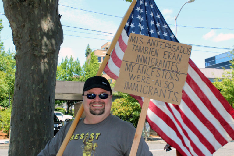 Washougal teacher Scott Rainey walks in the June 30 Families Belong Together March with his wife, Katrina (not pictured), on June 30.