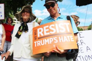 Sylvia Manheim, 93 (left), of Skamania County, and Larry Jacobson (right), of Manzanita, Ore., attend a Families Belong Together march in support of immigrants and in protest of recent Trump administration policies that have detained asylum seekers on the southern United States border and separated immigrant families. The march, which took place Saturday, June 30, in downtown Vancouver, was one of about 30 happening throughout Washington. 