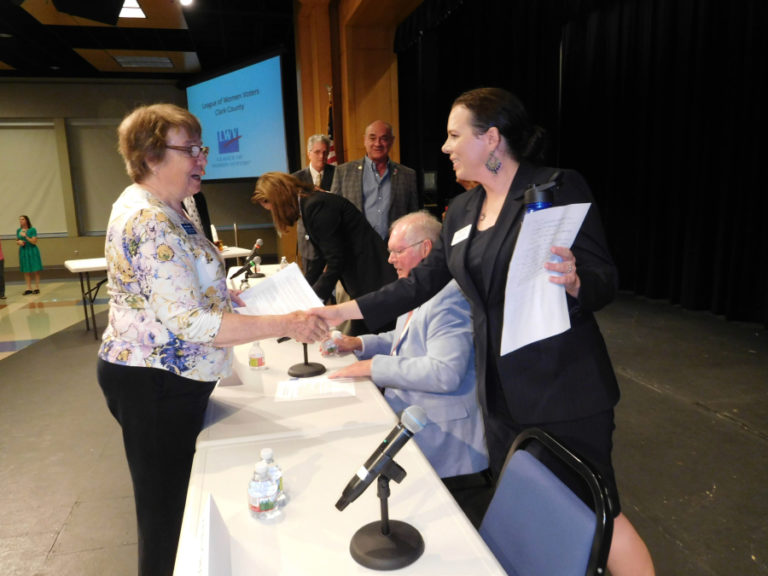 Judy Hudson (left), voter services co-chair of the League of Women Voters of Clark County, meets Dorothy Gasque, a Democratic candidate for the 3rd Congressional District, after a League forum, July 12, at Clark College, in Vancouver.