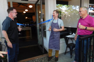 Don Riedthaler (left) enjoys a festive grand opening celebration at Hey Jack restaurant with co-owner Peter Rudolph (center), as Camas Mayor Pro Tem Don Chaney (right) looks on, July 6, in downtown Camas. Hey Jack is open for dinner Tuesday through Saturday, and for brunch on Sunday. 