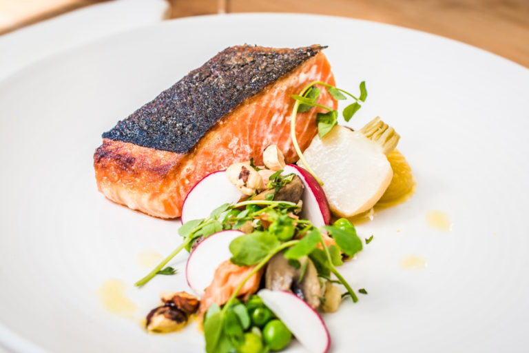 A Hey Jack dish featuring salmon, turnips, mushrooms, hazelnuts, celery root and pernod, prepared by Michelin-starred chef Peter Rudolph.
